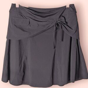 Athleta Black Stretch Tennis Skirt Tie Detail size 10 M